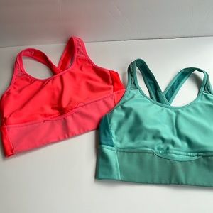 2 beautiful and bright Under Armour sports bras
